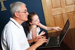 child learning with grandpa