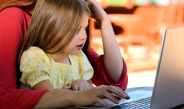 mother and child working at home